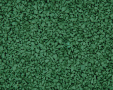 Close-up view of a textured green rubber surface, often used for playgrounds or athletic tracks, showing small, irregularly shaped rubber pieces tightly packed together.